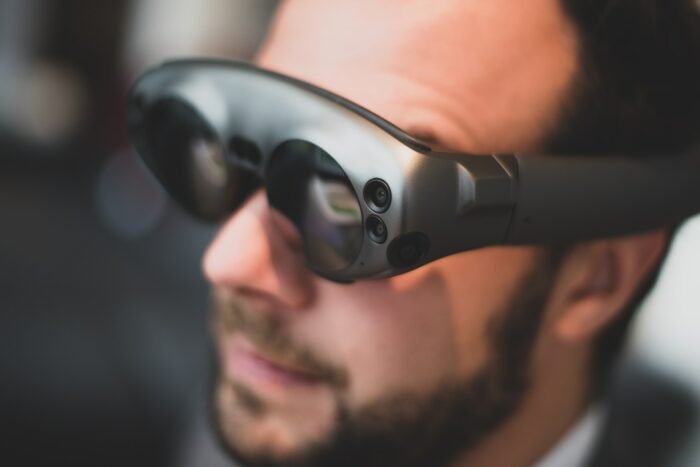 man joining metaverse trough VR glasses